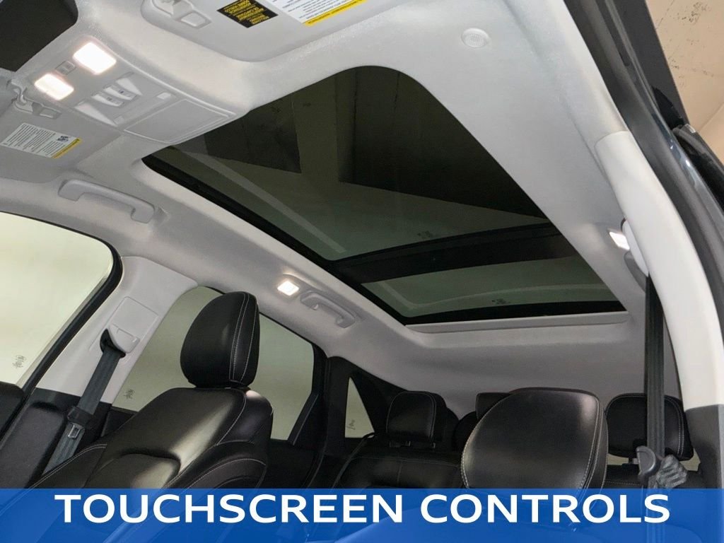 Certified Used 2022 Blue Metallic Ford SEL image 4