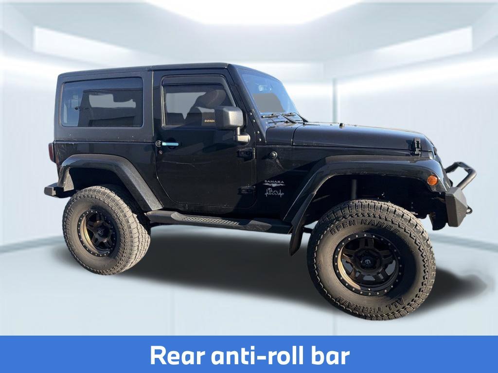 Used 2015 Black Clearcoat Jeep Sahara image 6
