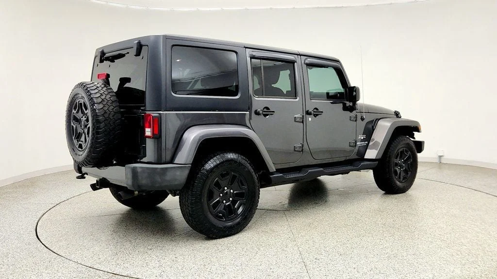 Used 2017 Granite Crystal Metallic Clearcoat Jeep Sahara 4x4 w/ Heated Seats, Remote Start & Connectivity Pkg image 5
