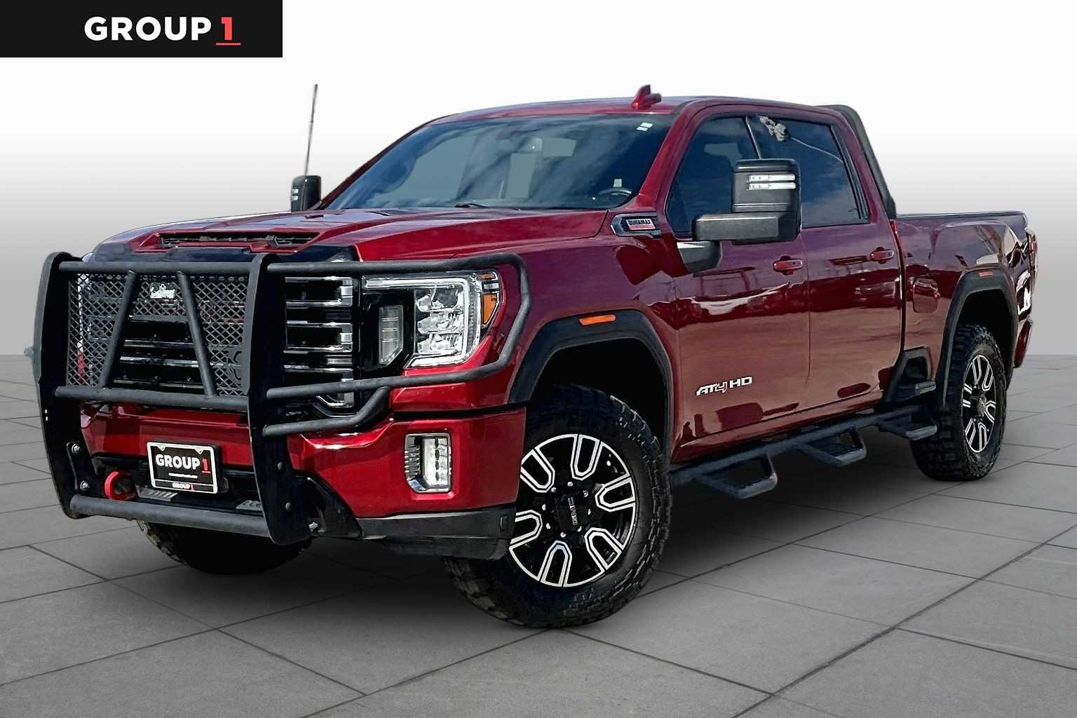 Used 2023 CAYENNE RED TINTCOAT GMC AT4 image 1