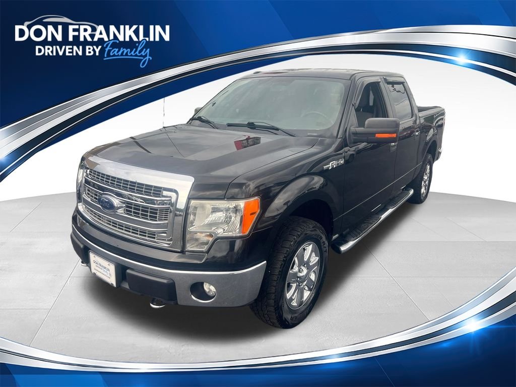 Used 2013 Black Ford XLT image 1