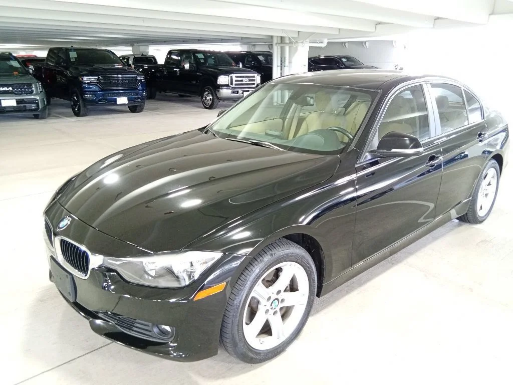 Used 2015 Jet Black BMW 328i xDrive image 1