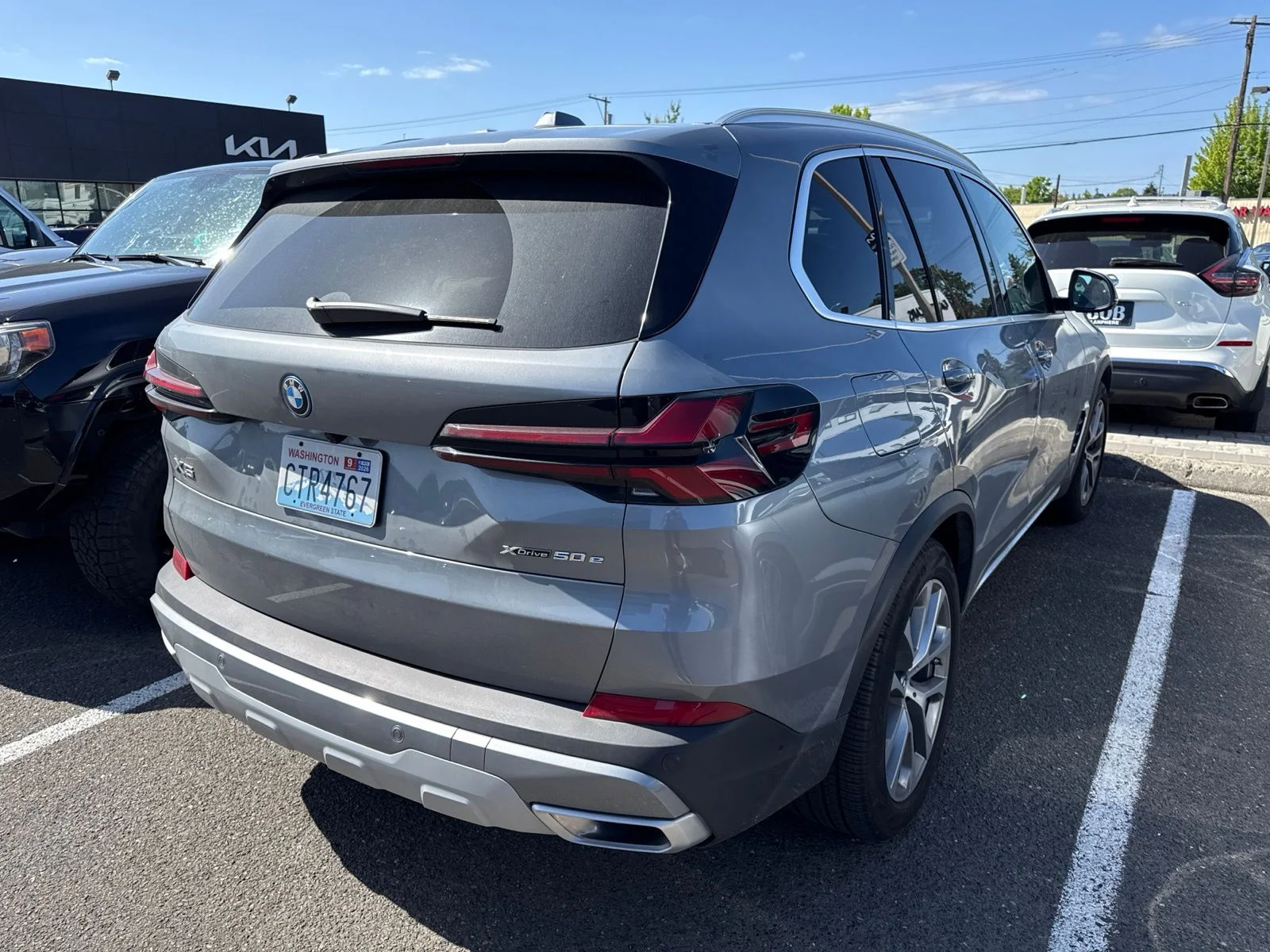 Used 2025 Gray Metallic BMW xDrive50e image 3