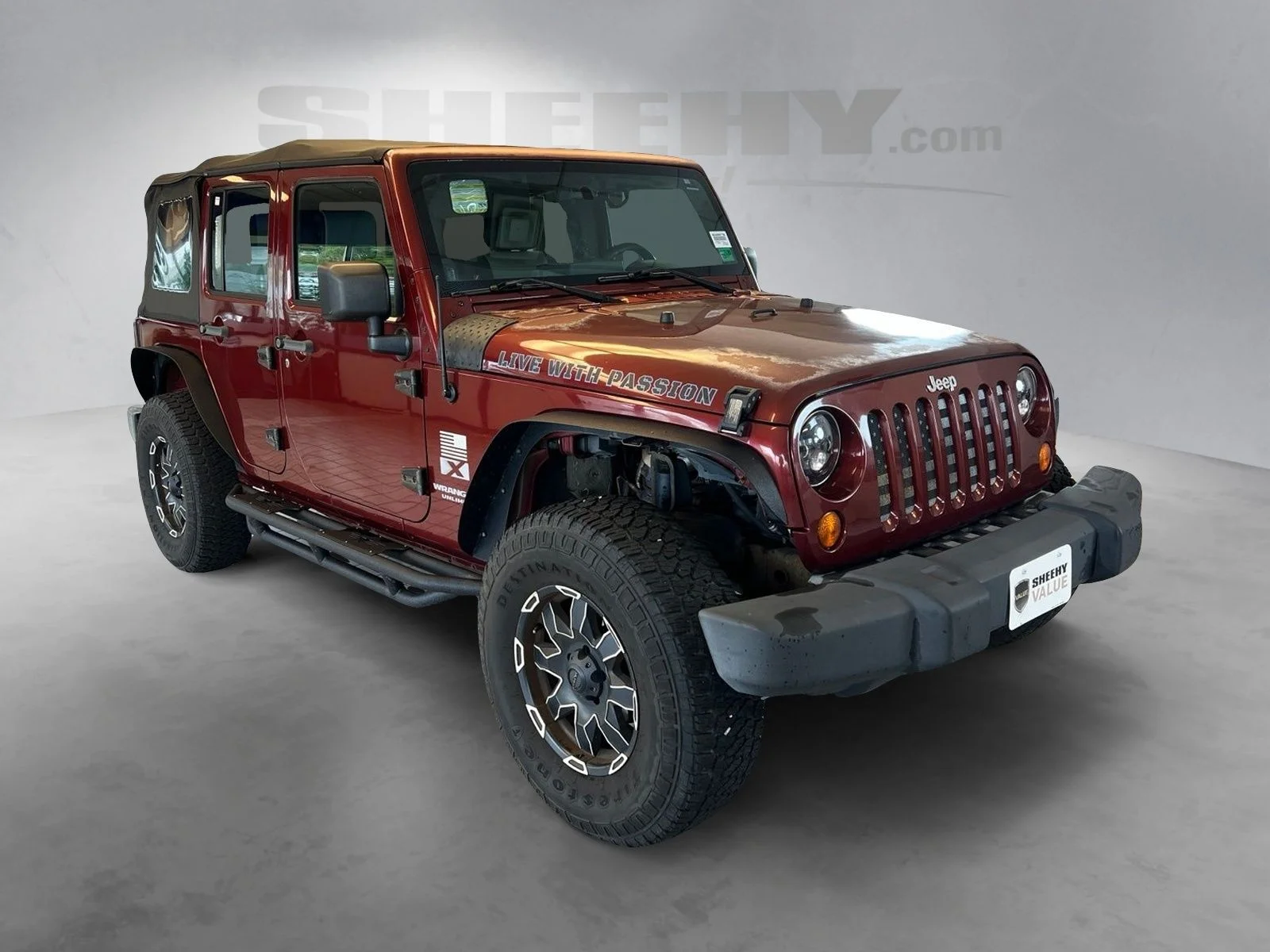 Used 2007 Red Rock Crystal Pearlcoat Jeep Unlimited X image 14