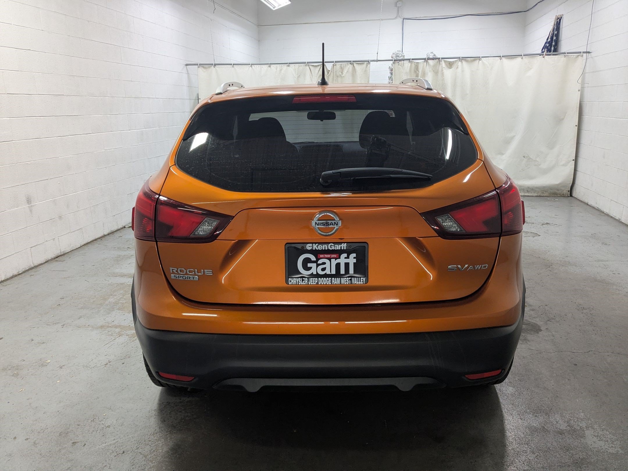 Used 2017 Monarch Orange Nissan SV image 5
