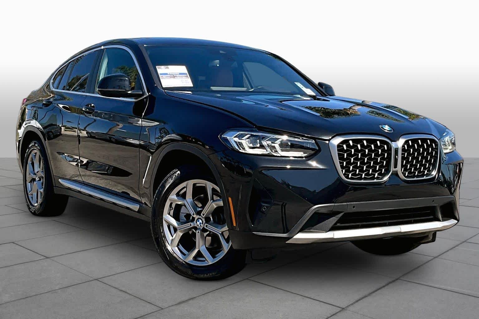 Used 2024 Black Sapphire Metallic BMW xDrive30i image 2