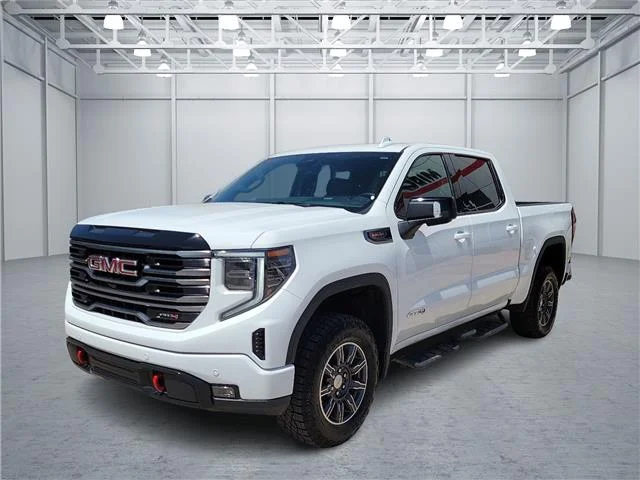 Used 2025 Summit White GMC AT4 4x4 Crew Cab 5.75 ft. box 147.4 in. WB image 1