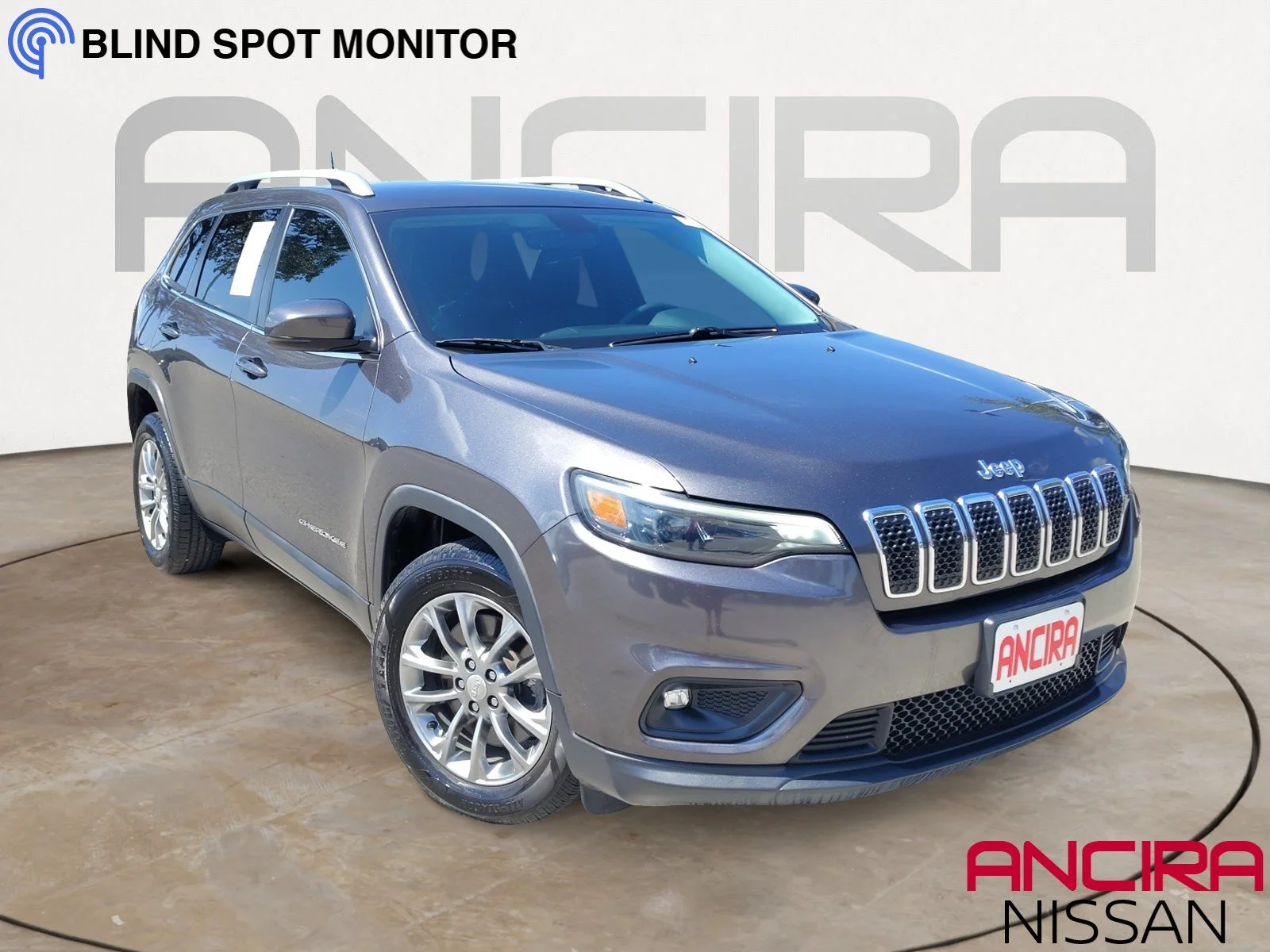 Used 2020 Granite Crystal Metallic Clearcoat Jeep Latitude Plus image 1