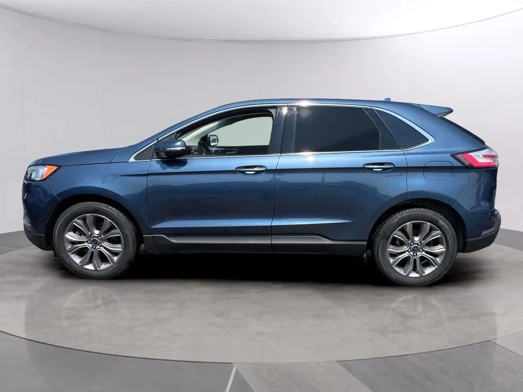 Used 2019 Blue Metallic Ford Titanium image 3