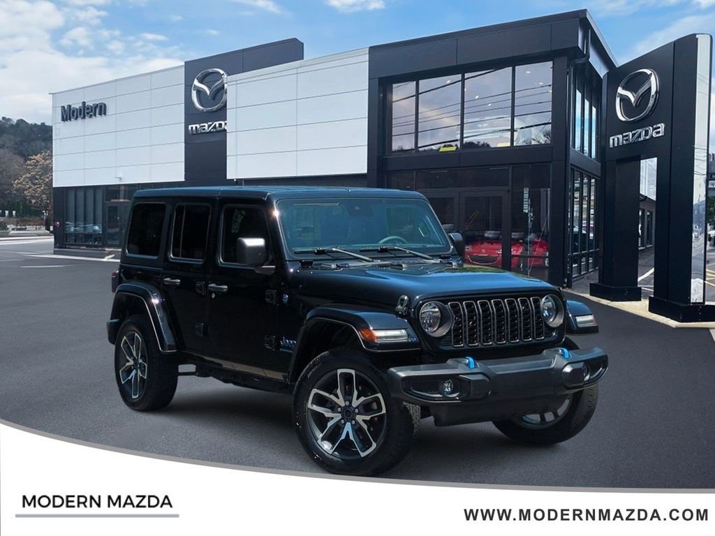 Used 2024 Black Jeep Sport S 4xe image 1