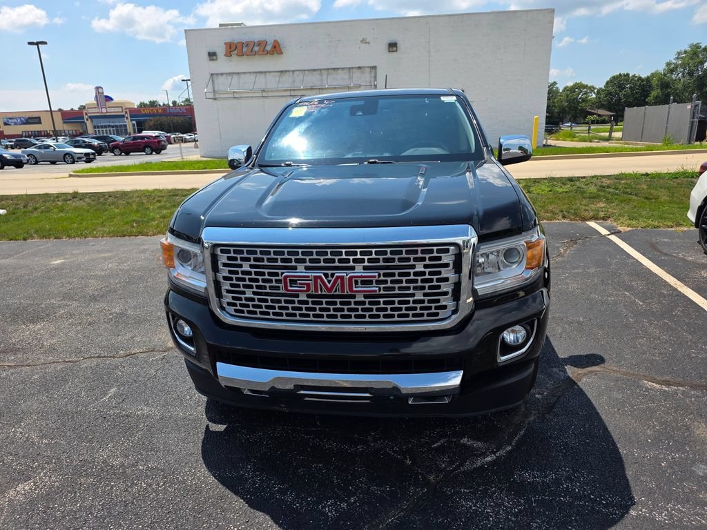 Used 2017 Onyx Black GMC 4WD Denali image 1