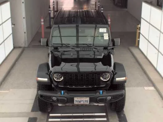 Used 2024 Jeep Wrangler 4xe Willys 4XE with VIN 1C4RJXN6XRW145504 for sale in Kansas City