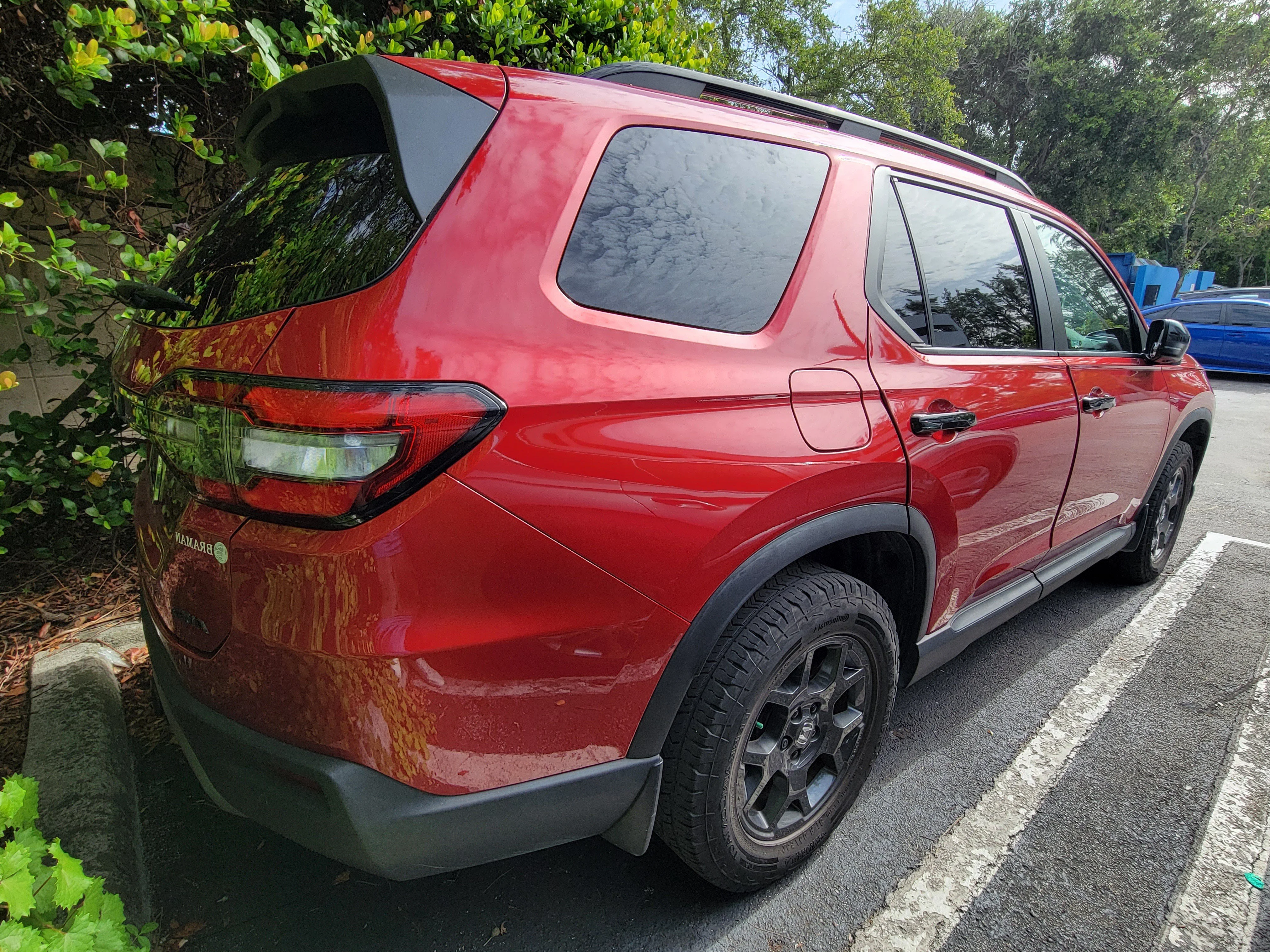 Certified Used 2024 Radiant Red Metallic II Honda AWD TRAILSPORT image 3