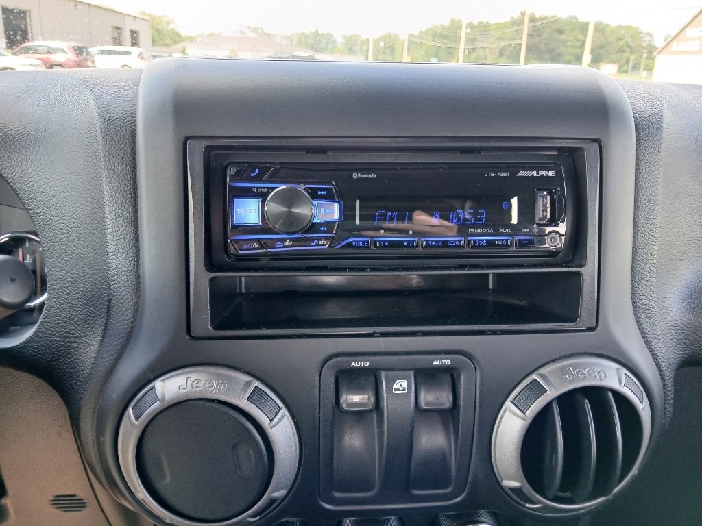 Used 2015 Black Clearcoat Jeep Sport image 15