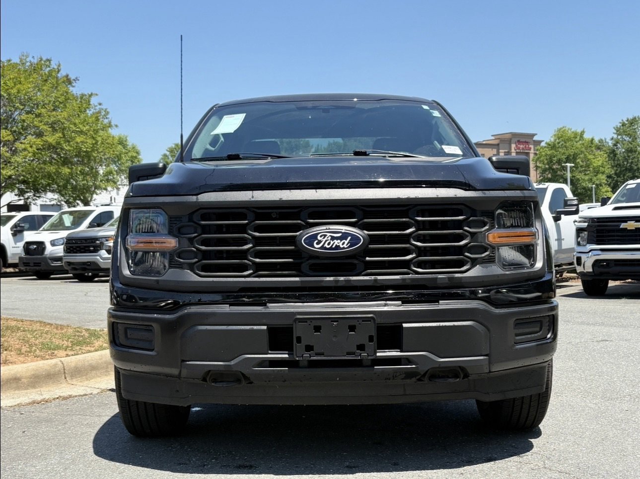 Used 2024 Agate Black Metallic Ford XL image 7