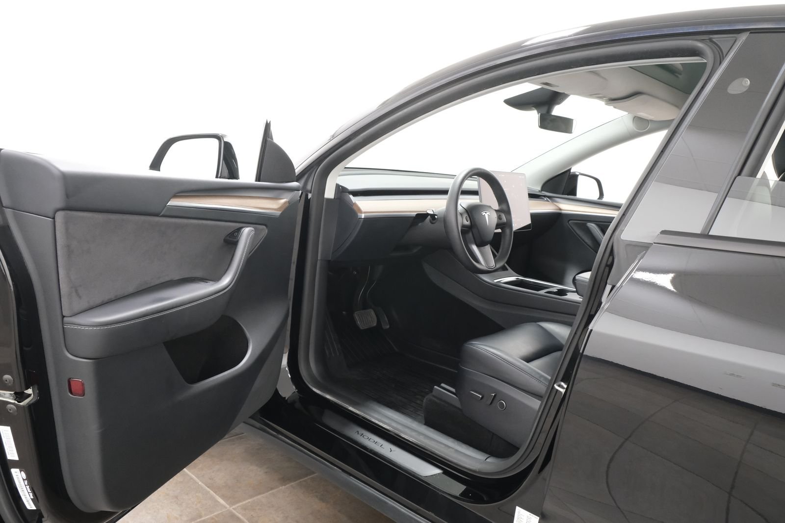 Used 2024 Solid Black Tesla Long Range image 24