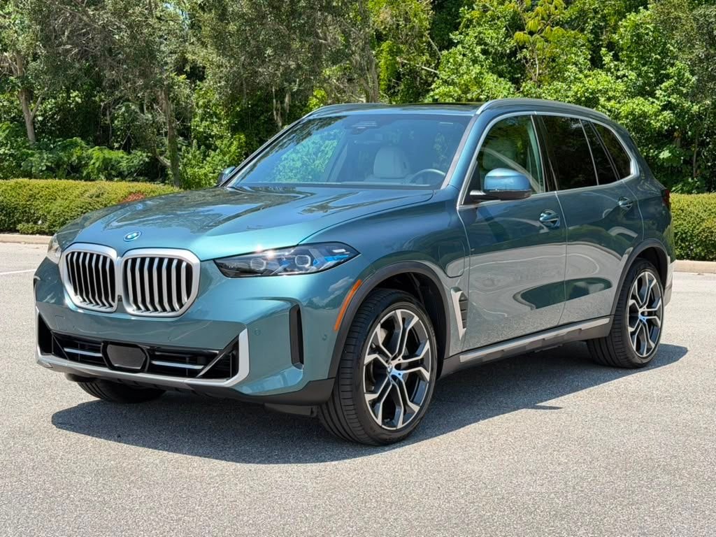 Used 2026 Blue BMW xDrive50e image 1