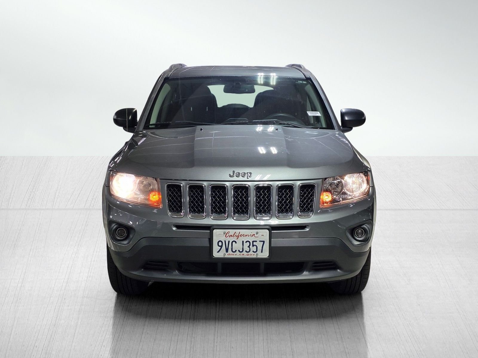 Used 2014 Jeep Compass Sport with VIN 1C4NJCBA3ED619606 for sale in Long Beach, CA