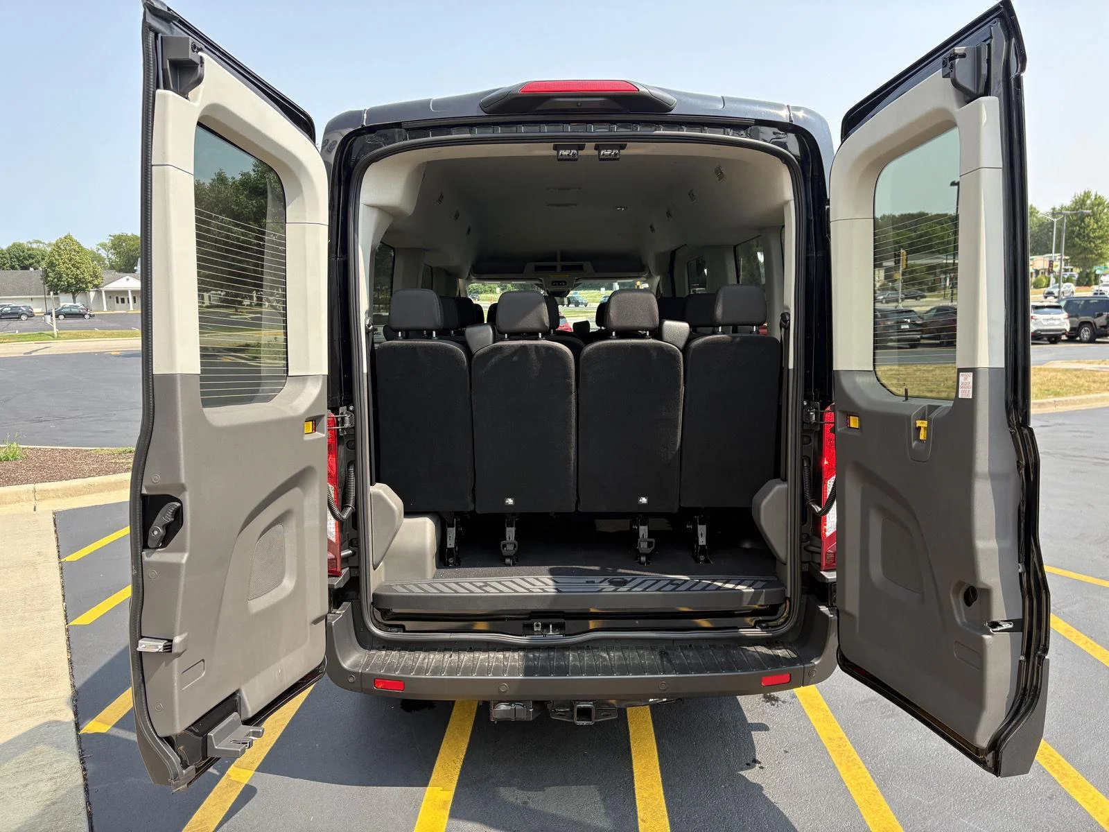 New 2026 Agate Black Metallic Ford Passenger Van XLT image 18