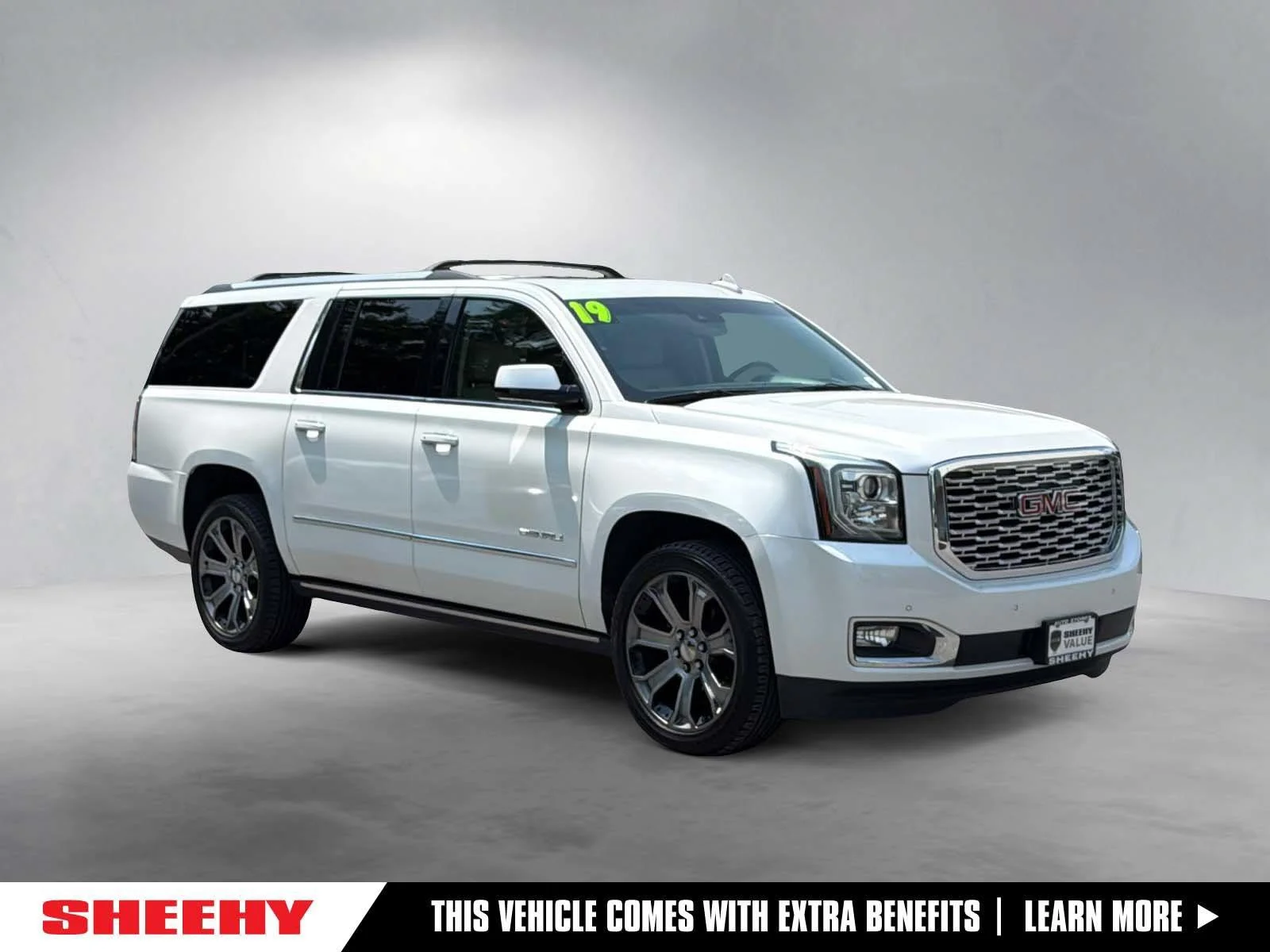 Used 2019 White Frost Tricoat GMC Denali image 1