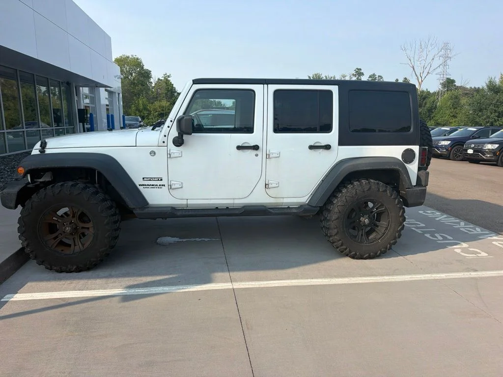 Used 2014 White Jeep Unlimited Sport image 4
