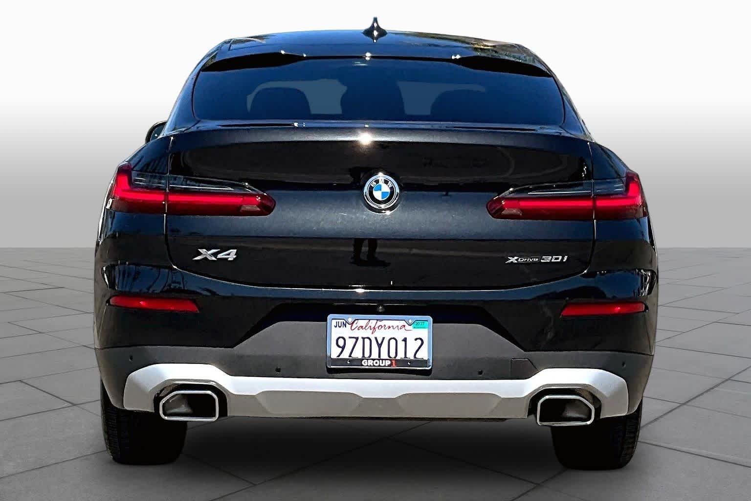 Used 2024 Black Sapphire Metallic BMW xDrive30i image 4