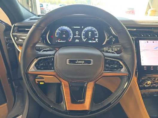 Used 2025 SILVER Jeep Summit Reserve image 8