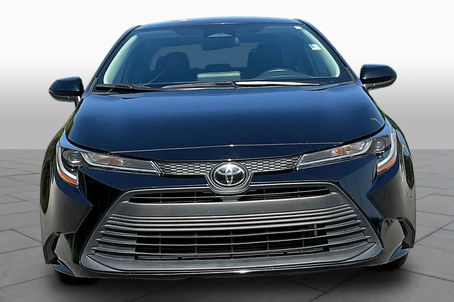 Used 2024 Midnight Black Metallic Toyota LE image 4