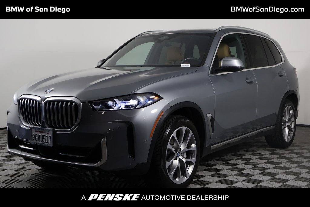 Used 2024 Skyscraper Grey Metallic BMW sDrive40i image 1