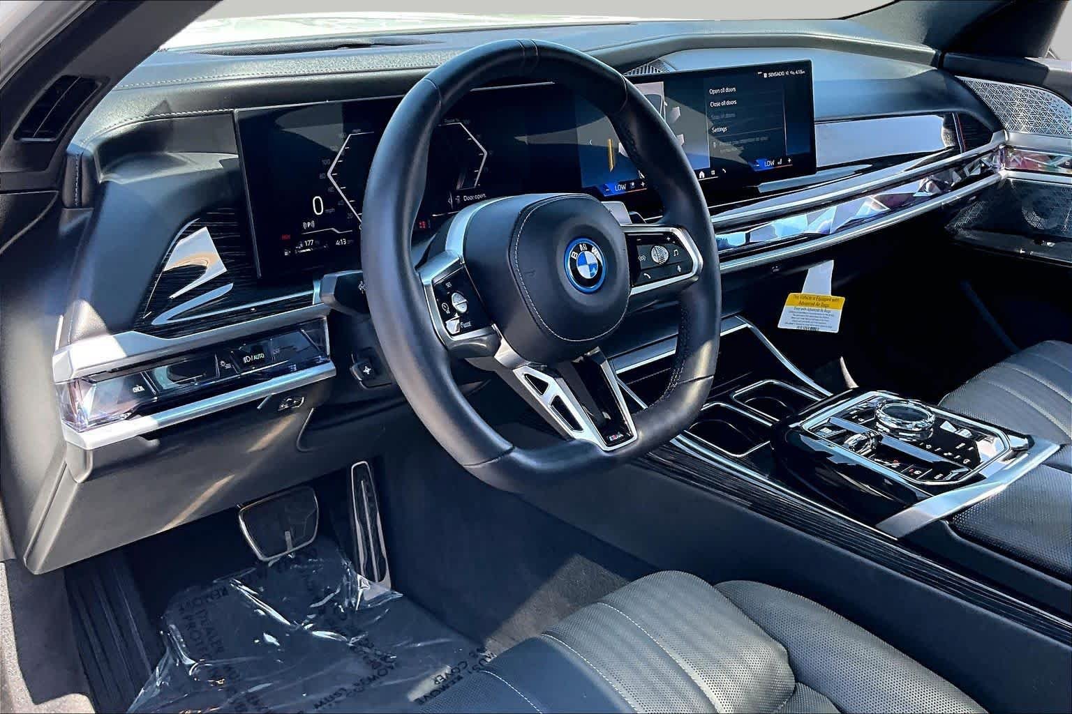 Used 2025 Mineral White Metallic BMW 750e xDrive image 17