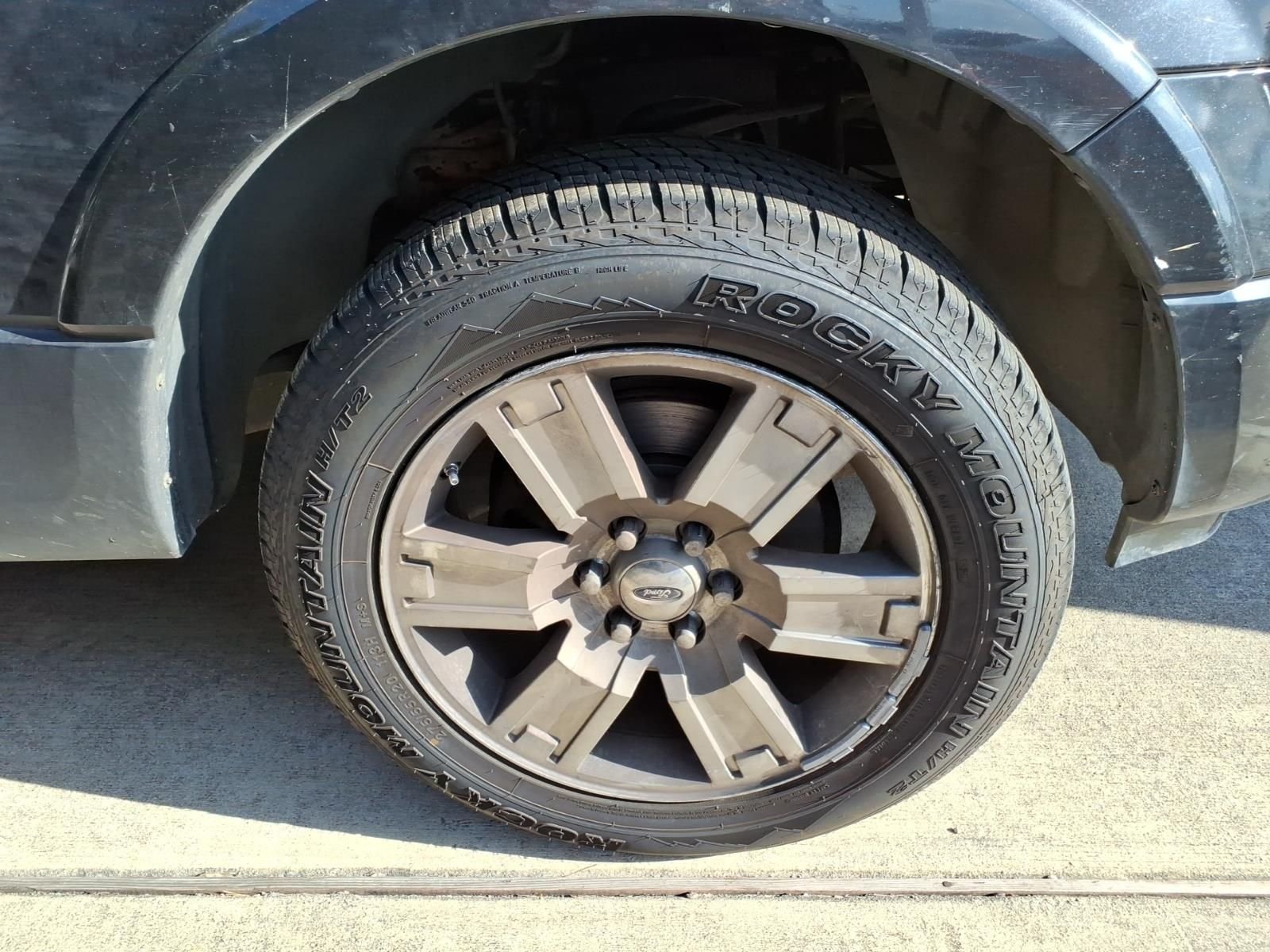 Used 2010 Tuxedo Black Metallic Ford Limited image 10