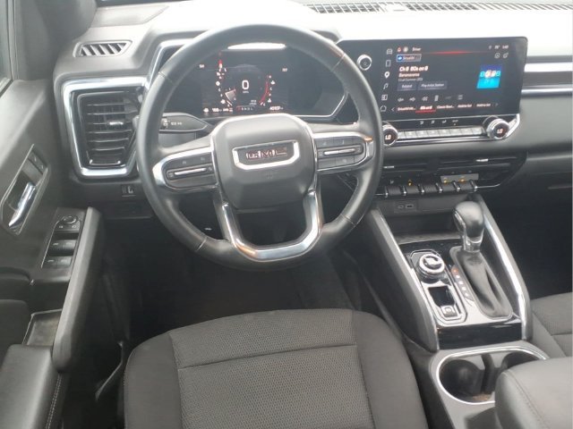Used 2023 DYNAMIC BLUE METALLIC GMC 4WD Elevation image 5
