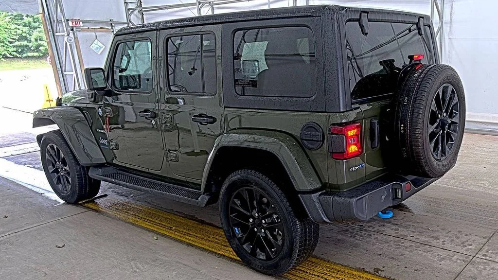 Used 2023 Green Jeep Sahara 4xe image 4