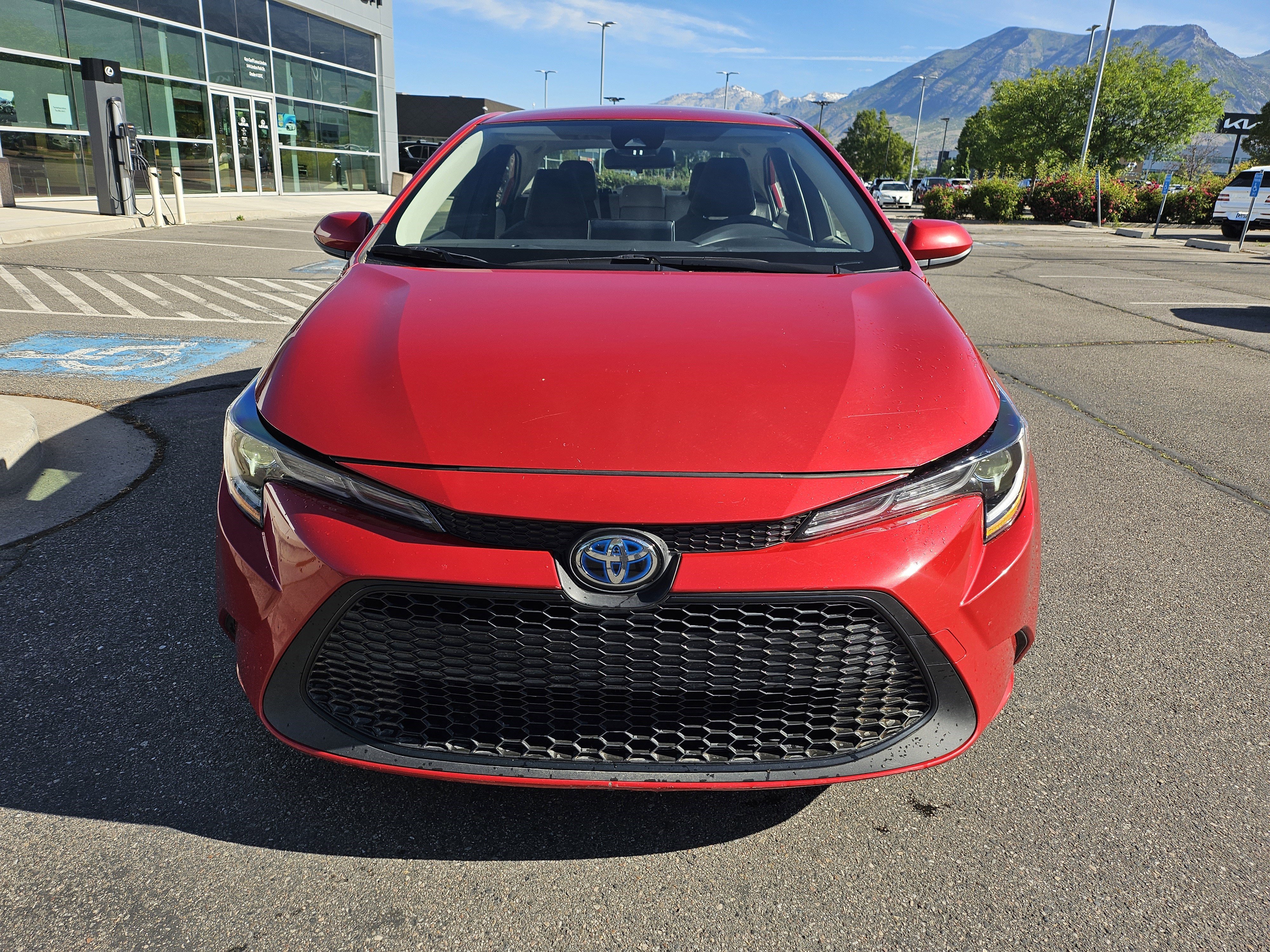 Used 2021 Barcelona Red Metallic Toyota LE image 2