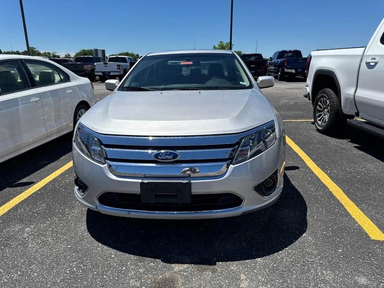 Used 2012 Ingot Silver Metallic Ford 4dr Sdn SEL FWD image 4