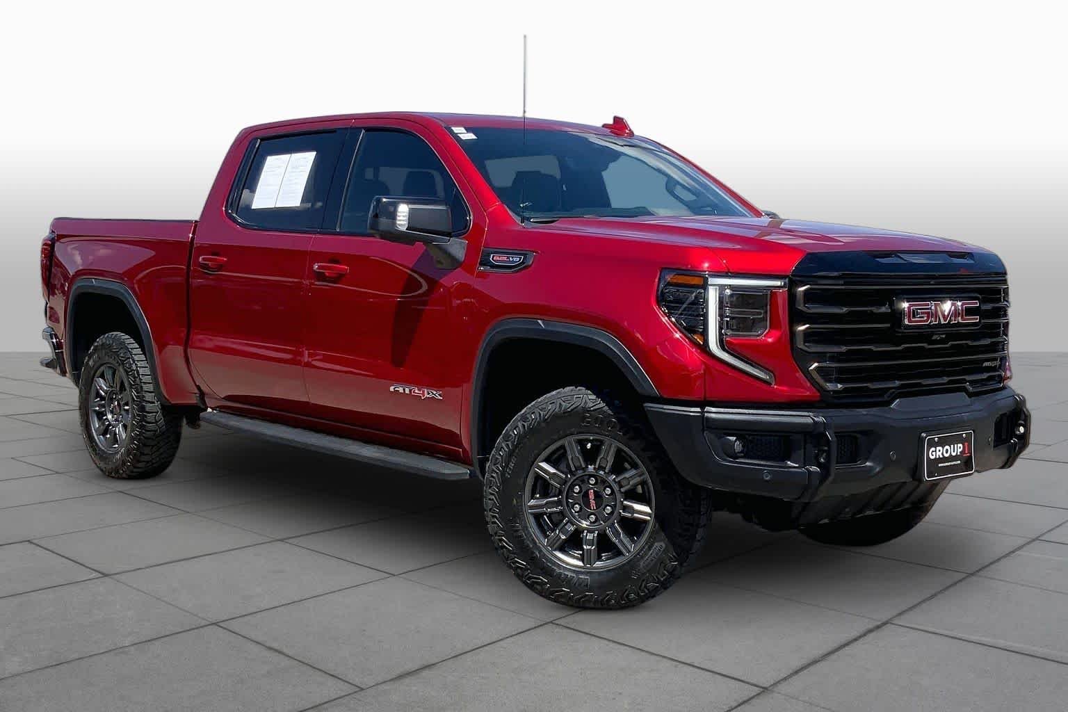 Used 2024 Volcanic Red Tintcoat GMC AT4X image 3
