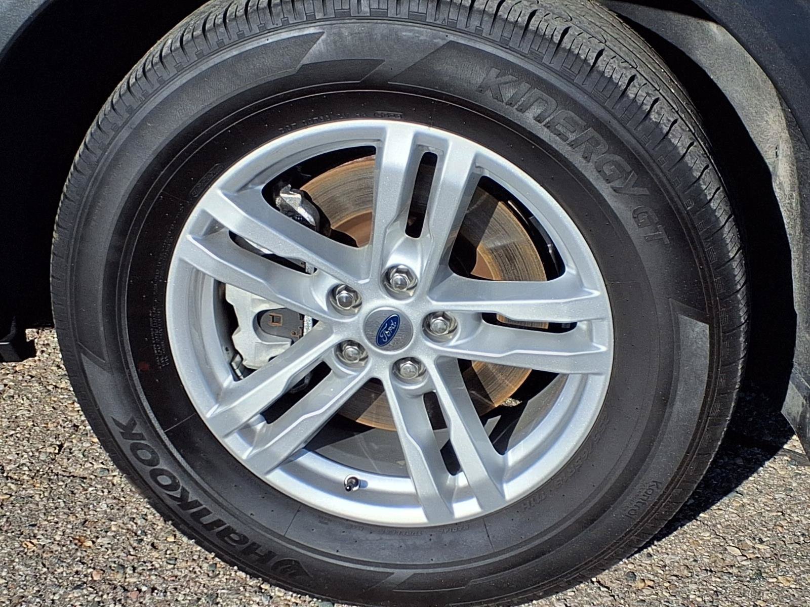 Certified Used 2024 Agate Black Metallic Ford XLT image 31