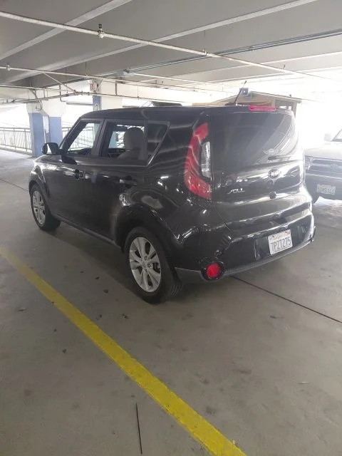 Used 2016 Black Kia Plus image 3