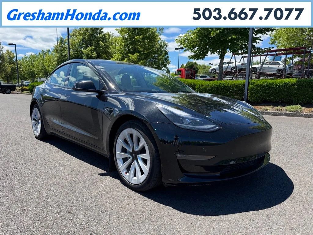 Used 2023 Solid Black Tesla Long Range image 1