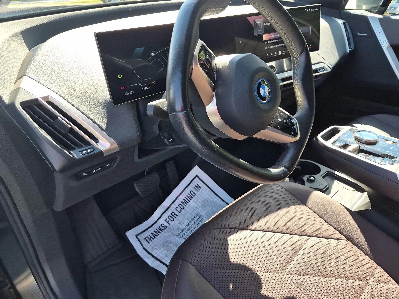Used 2024 Black Sapphire Metallic BMW xDrive50 image 18