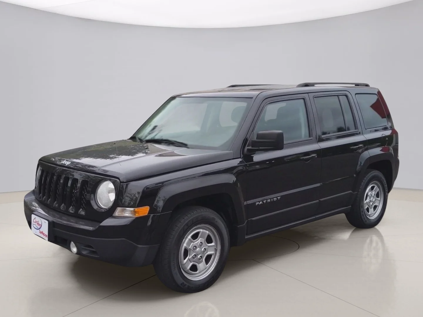 Used 2012 Black Jeep PATRIOT image 1