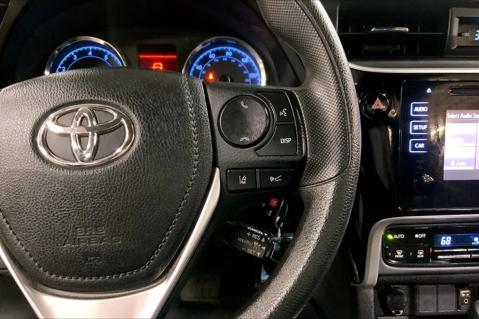 Used 2017 Classic Silver Metallic Toyota LE image 25