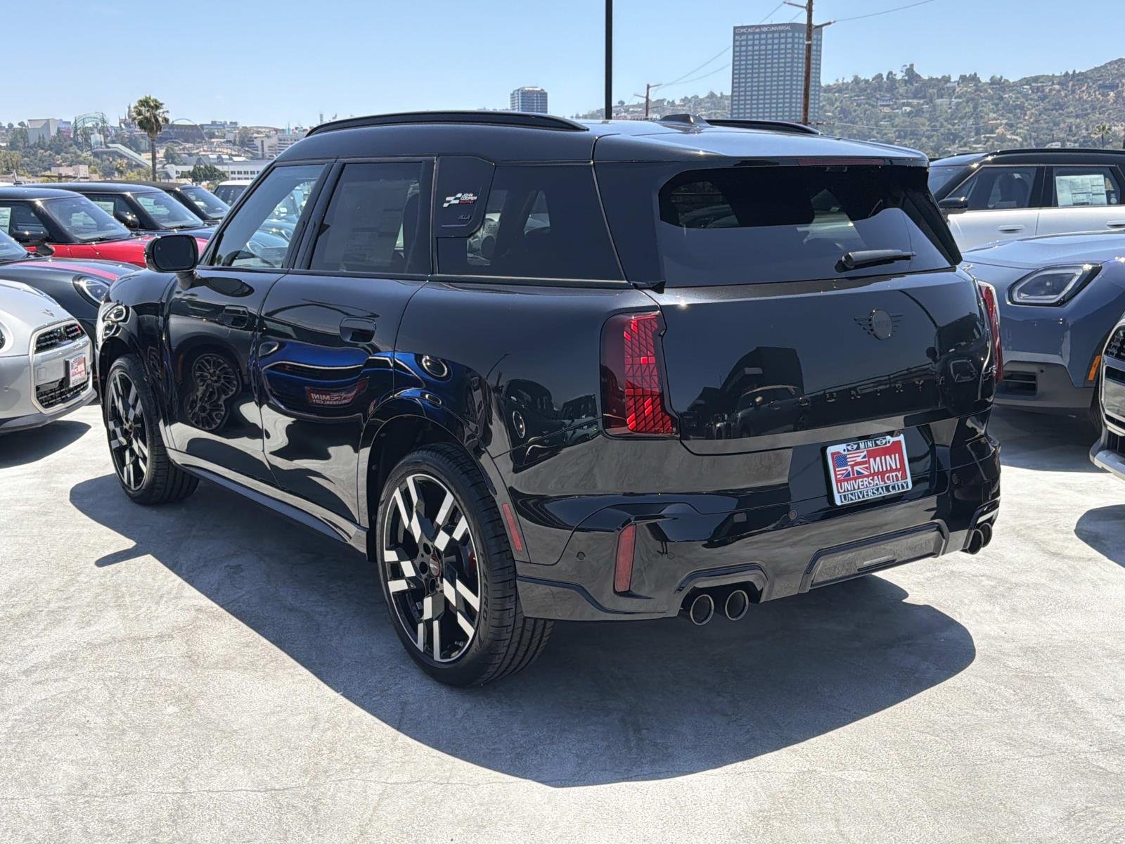 New 2027 0C4R Midnight Black II Metallic MINI Iconic image 4