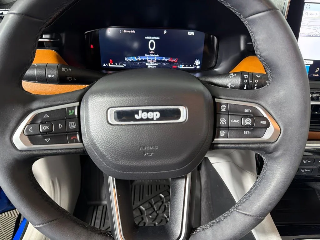 Used 2023 Laser Blue Jeep Limited image 14
