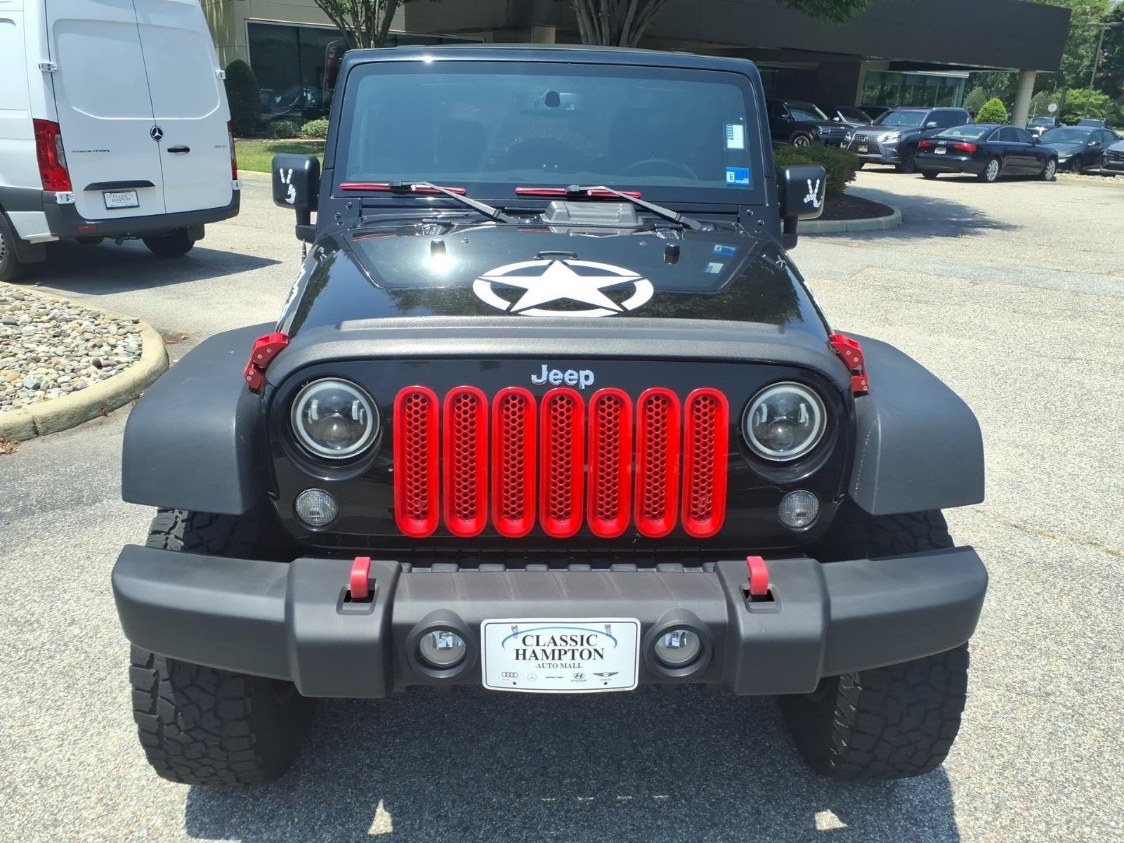 Used 2017 Black Clearcoat Jeep Sport image 2