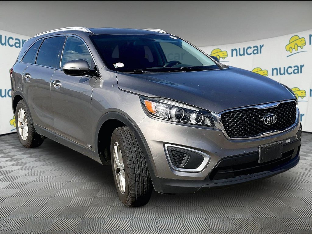 Used 2017 Titanium Silver Kia LX image 1