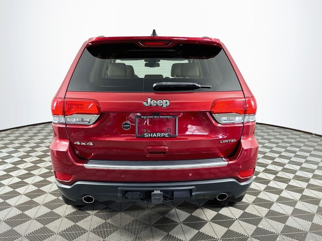 Used 2015 Deep Cherry Red Crystal Jeep Limited image 6
