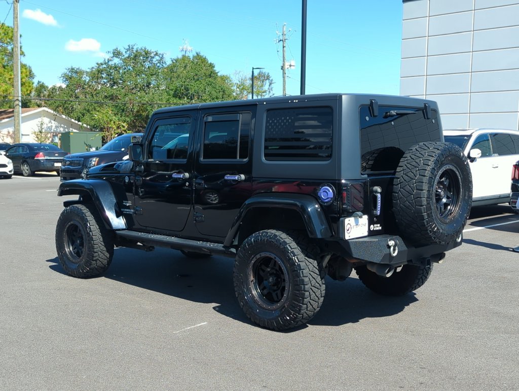 Used 2015 Black Jeep Unlimited Sahara image 5