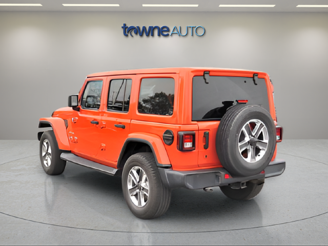 Used 2020 Orange Jeep Unlimited Sahara image 5