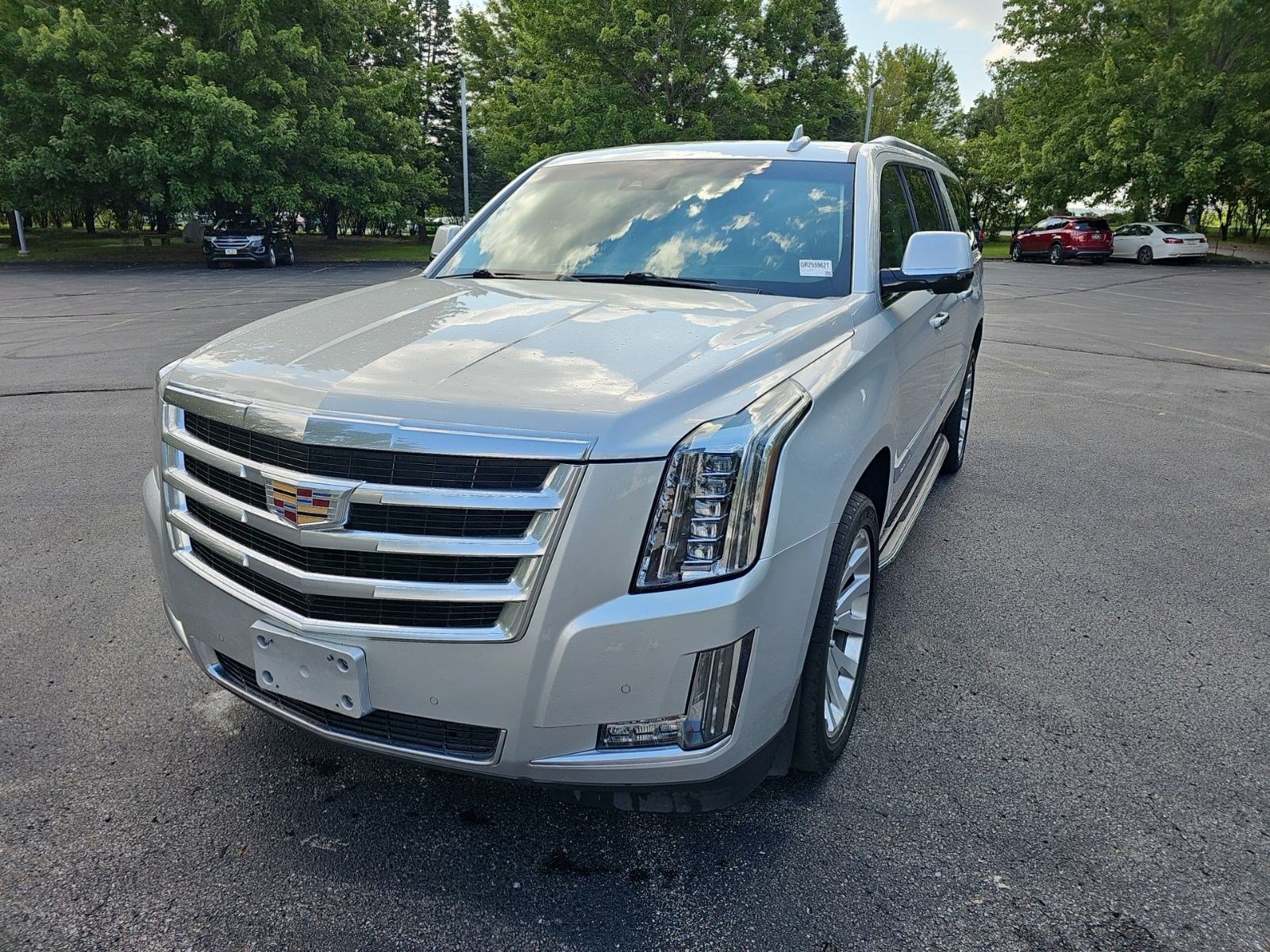 Used 2016 Radiant Silver Metallic Cadillac Luxury Collection image 2